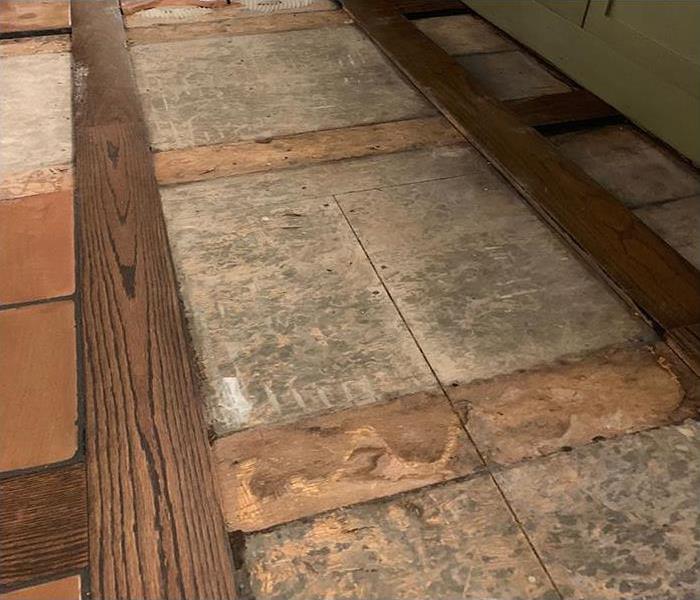 tiles removed after a water damage disaster
