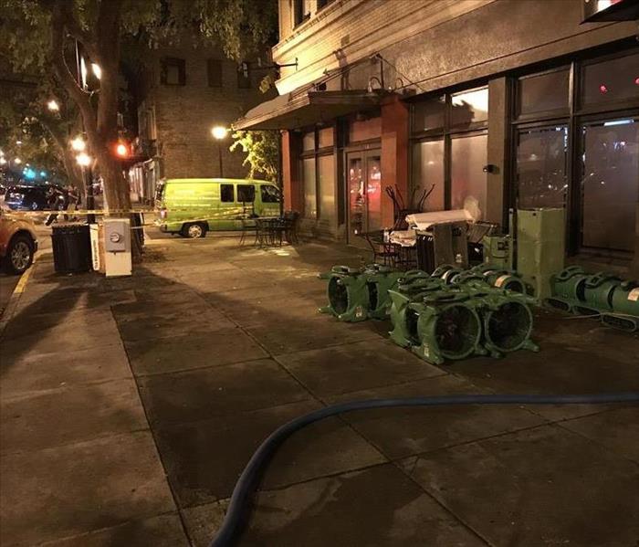 Image of SERVPRO equipment sitting curbside waiting to be placed in commercial business to begin restorative process.